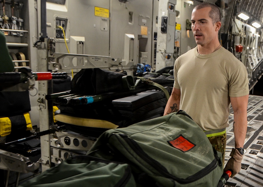 Airmen transport soldier suffering from respiratory failure