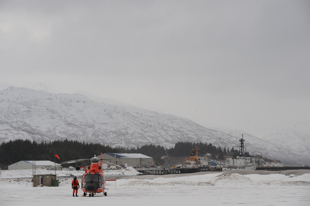 Air Station Kodiak H65 on ramp on snowy day