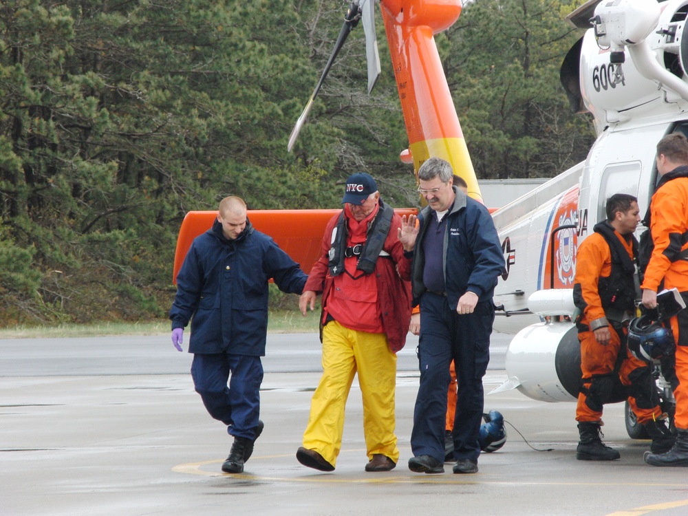 Coast Guard air crew rescues two from disabled sailboat 120 miles offshore