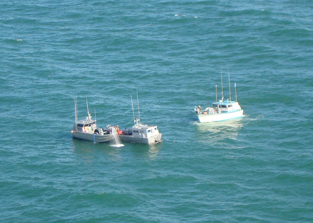 Coast Guard and good Samaritans assist fishing vessel Divalu dewater