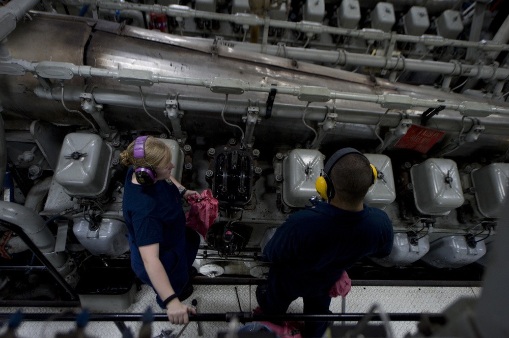 Coast Guard Cutter Forward engine room maintenance
