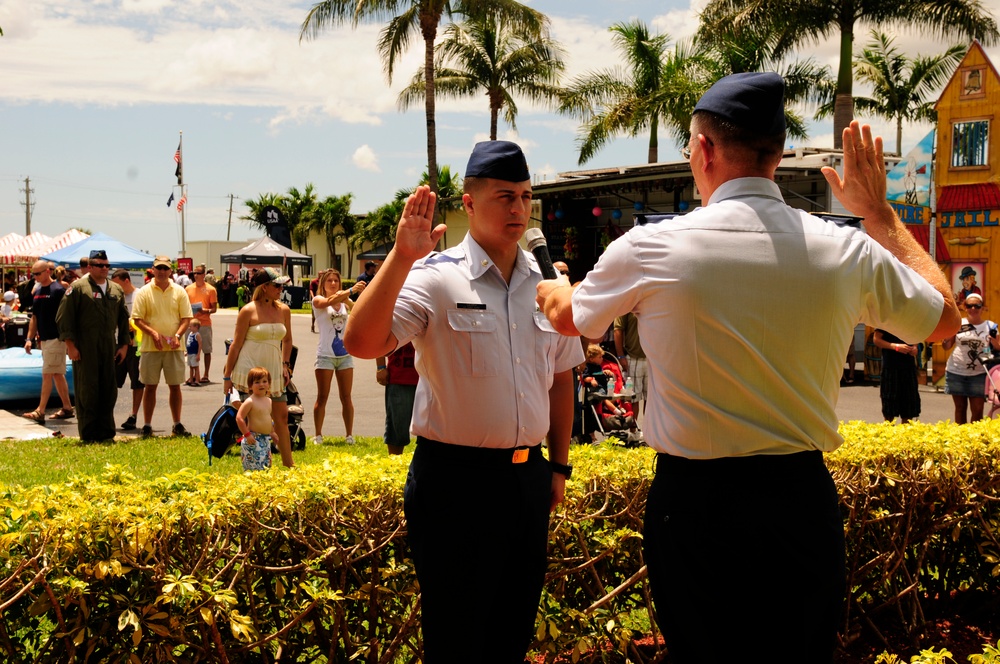 Petty Officer 3rd Class Angel Sierra re-enli
