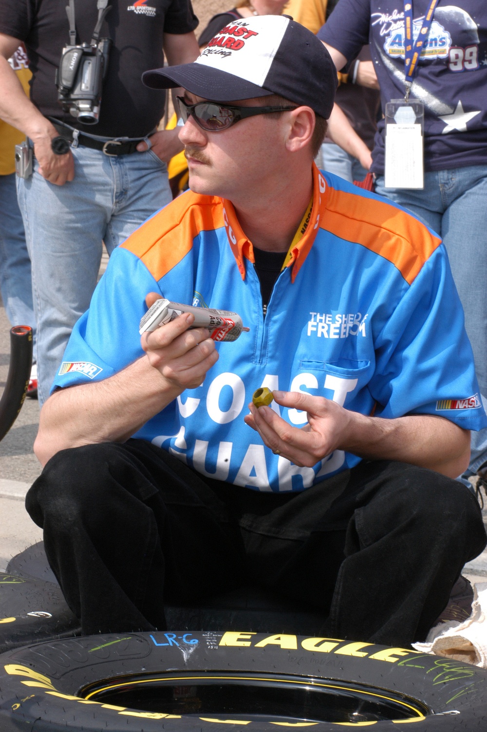 Team Coast Guard Racing pit crew member