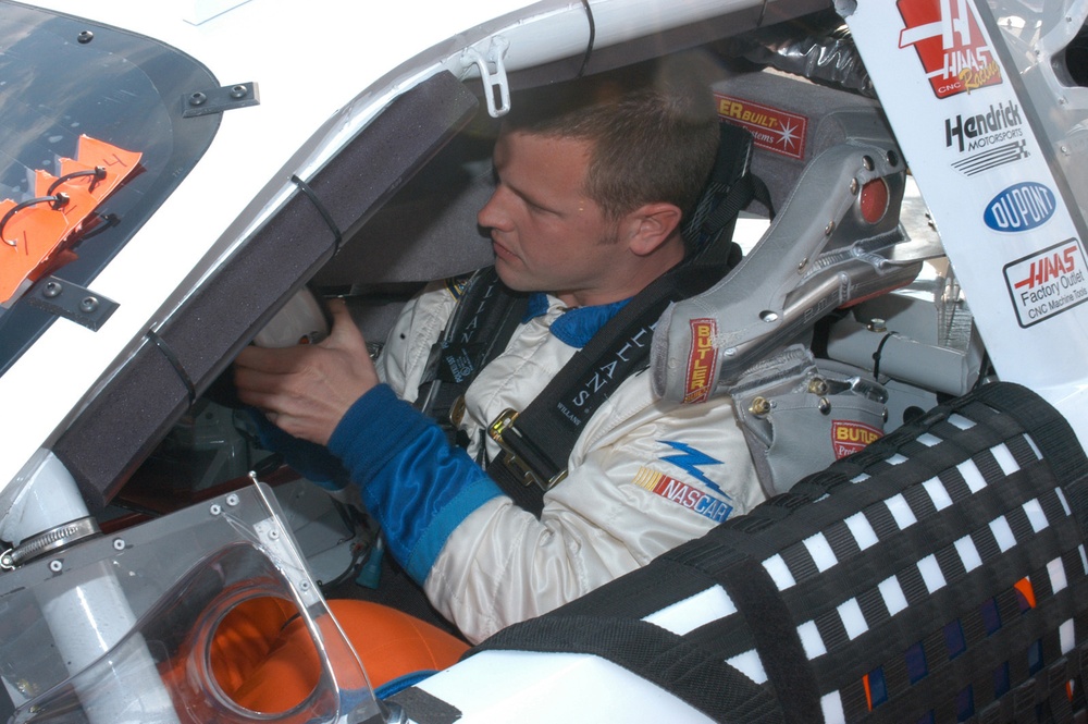 Coast Guard NASCAR team driver at Stater Bros. 300 race