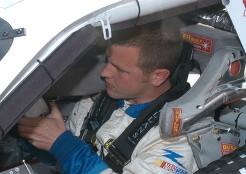 Coast Guard NASCAR team driver at Stater Bros. 300 race
