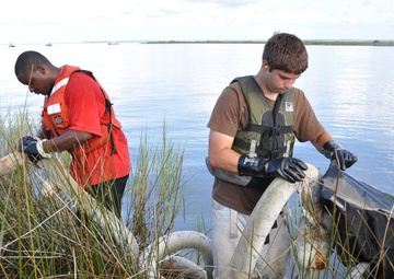 Oil debris removal near Bayou La Batre