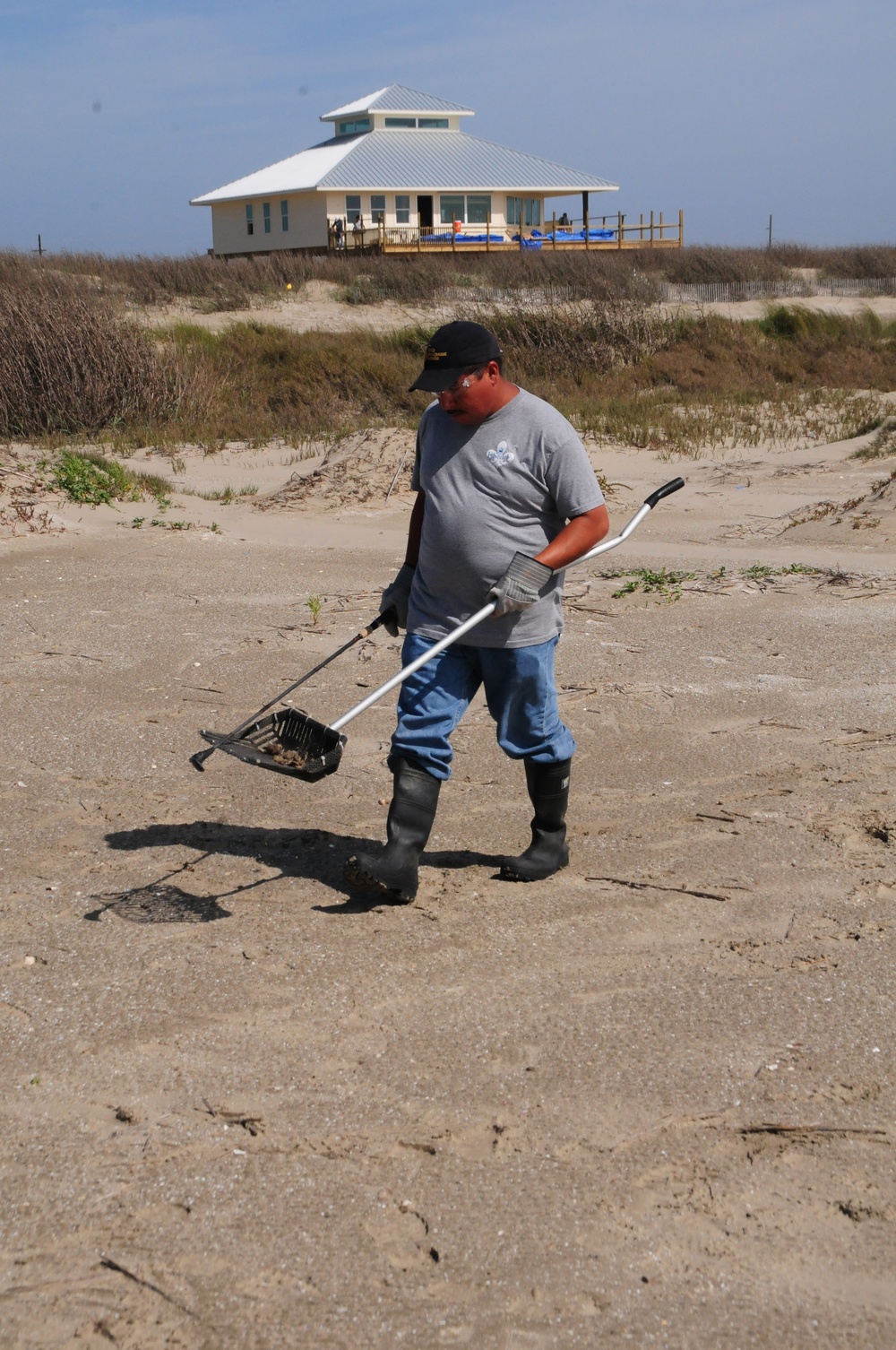 Grand Isle beach cleanup operations