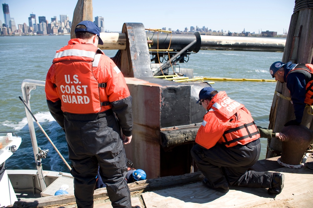 Coast Guard responds to capsized tugboat