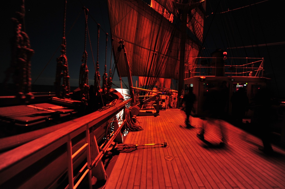 Coast Guard Cutter Eagle sails through the night