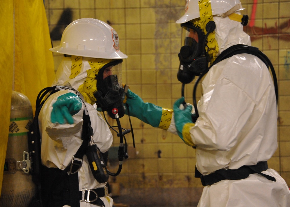 PIAT member in decontamination