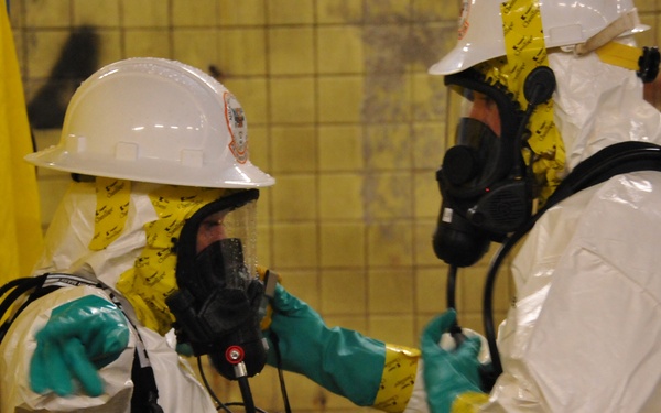 PIAT member in decontamination