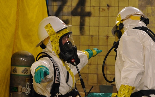 PIAT member in decontamination
