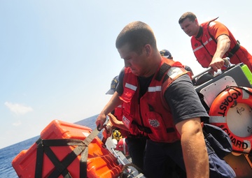 CG boat crew retrieves airdropped part