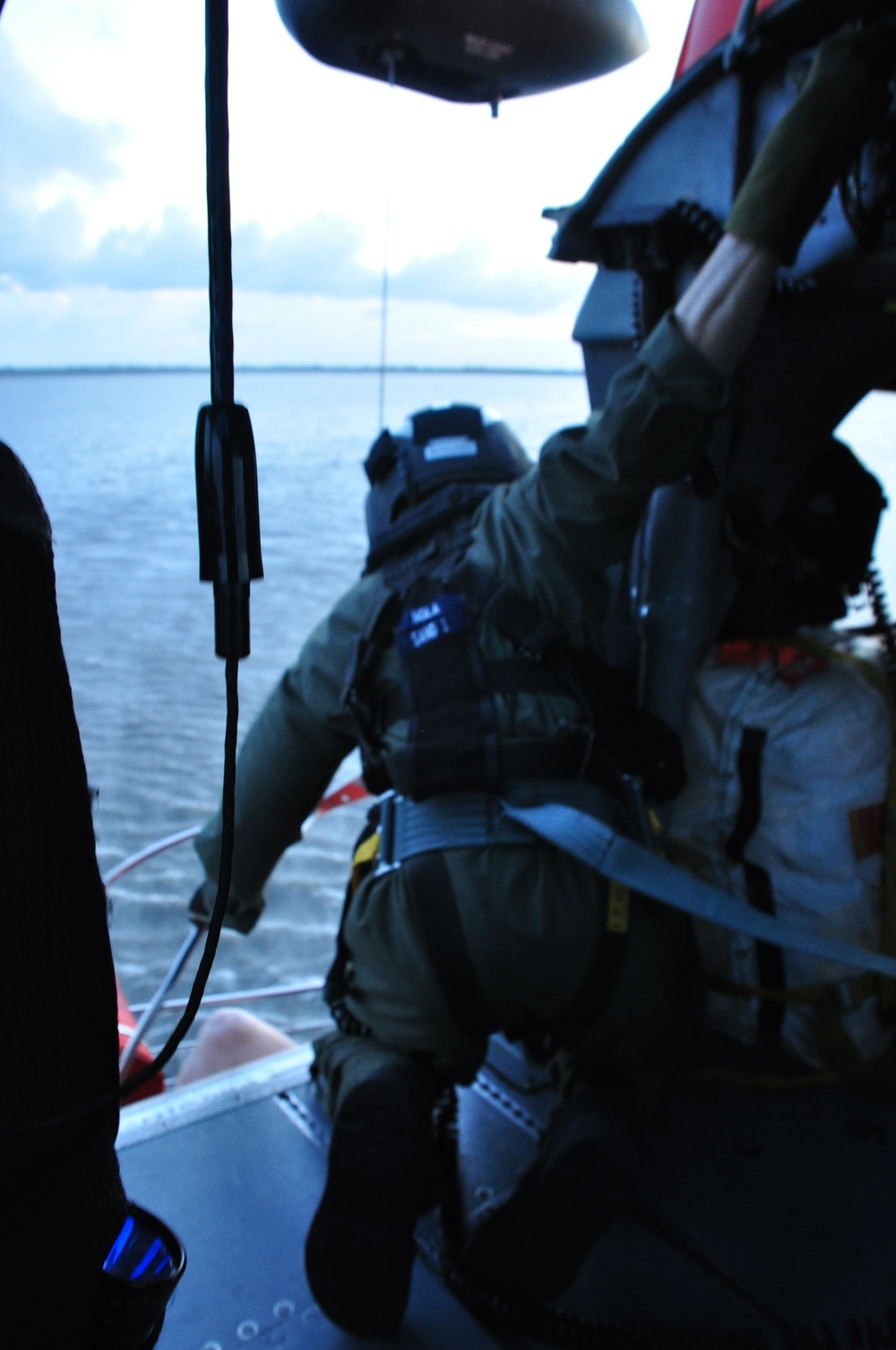 Air Station New Orleans rescues three from capsized vessel