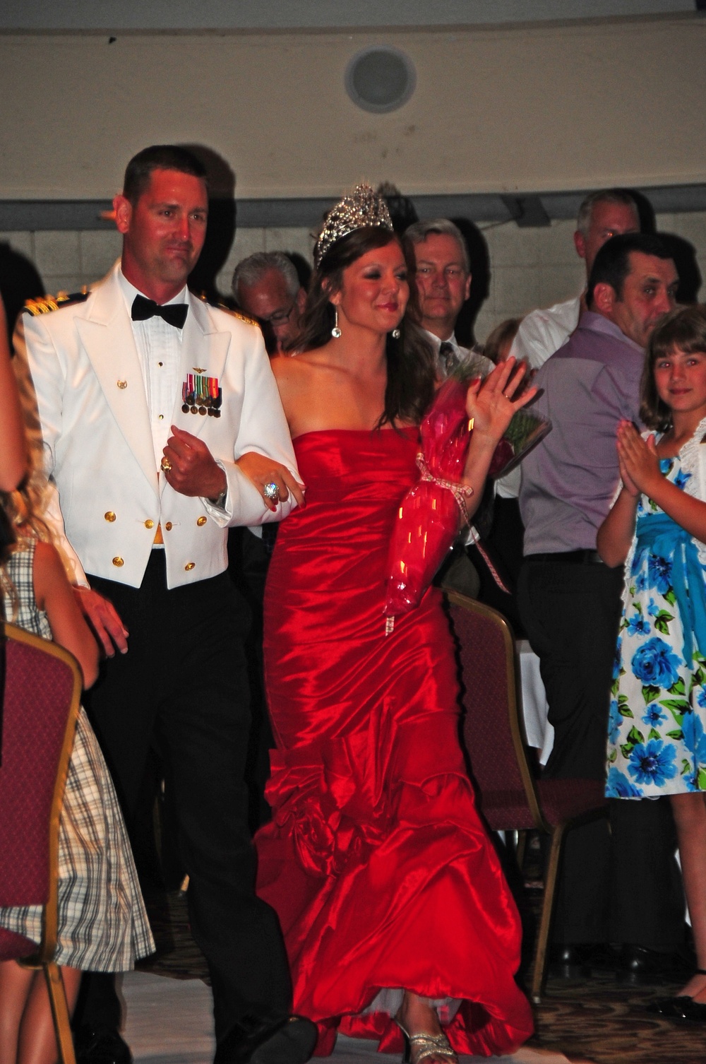 Cmdr. Buzzella escorts National Cherry Queen
