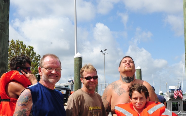 Five rescued from grounded vessel