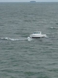 20' boat aground on rocks in Lake Erie