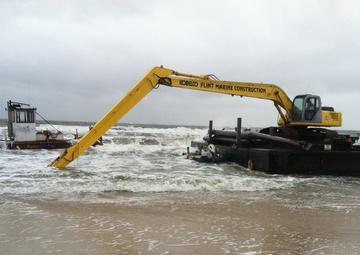 Coast Guard responds to aground tug and bar