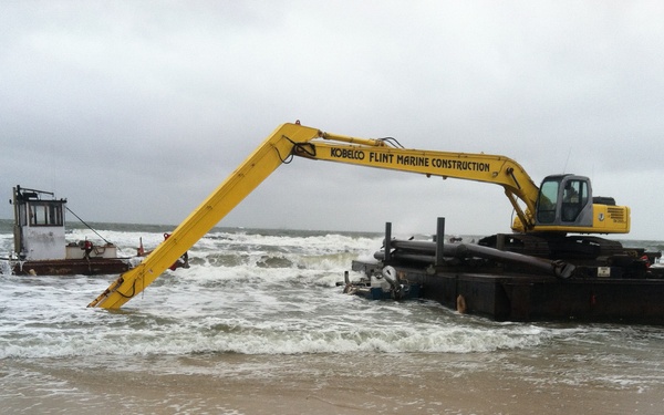 Coast Guard responds to aground tug and bar