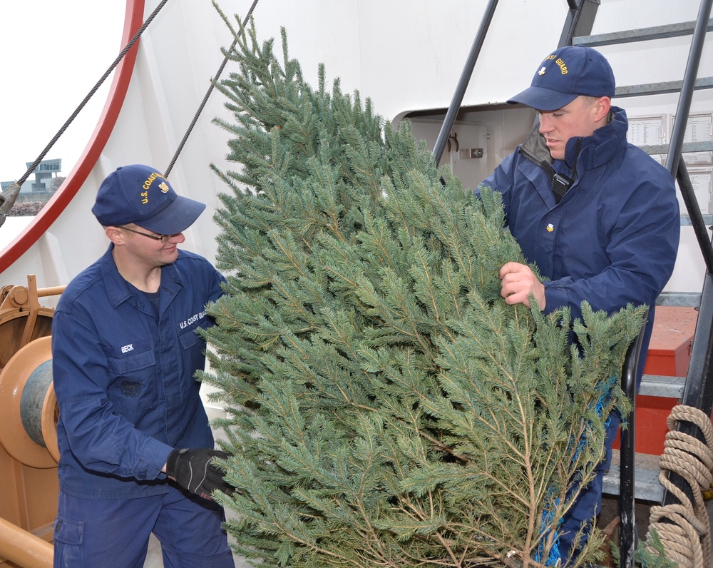 Coast Guard Cutter Mackinaw arrives in Chicago with Christmas trees.