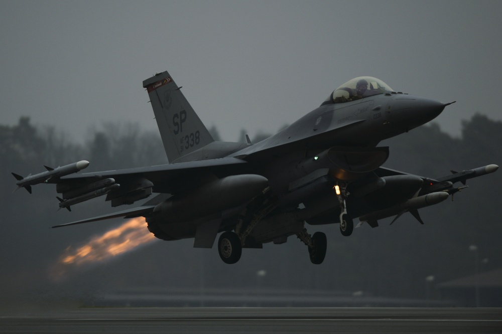 F-16's taxi and take off