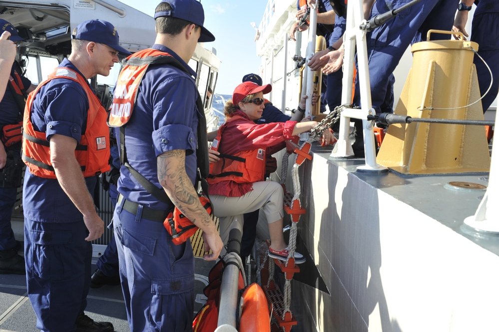 Coast Guard crewmembers assist Congresswoman Debbie Wasserman