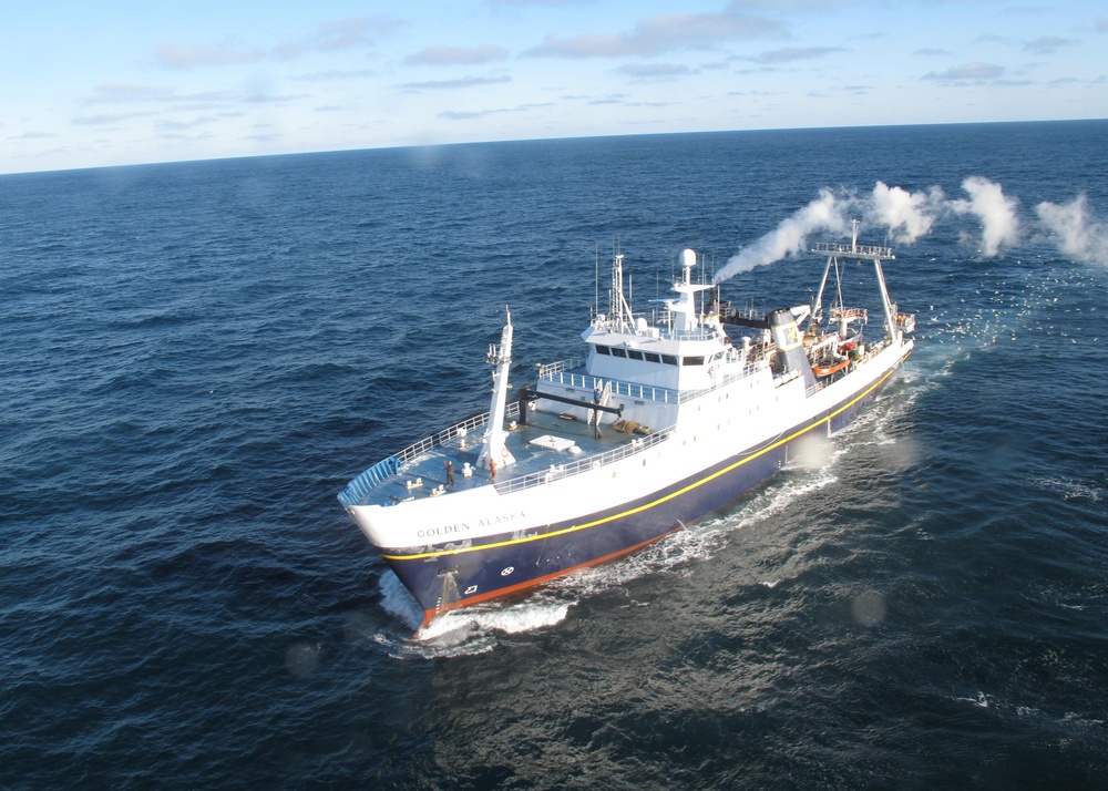 Coast Guard Kodiak-based HH-65 Dolphin helicopter crew medevacs fisherman from fishing vessel Golden Alaska