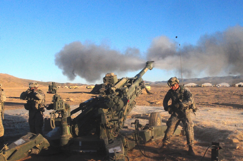 Artillerymen from 4th Battalion, 1st Field Artillery Regiment conduct live fire