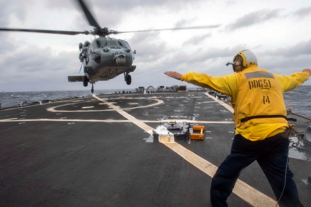 USS Arleigh Burke action