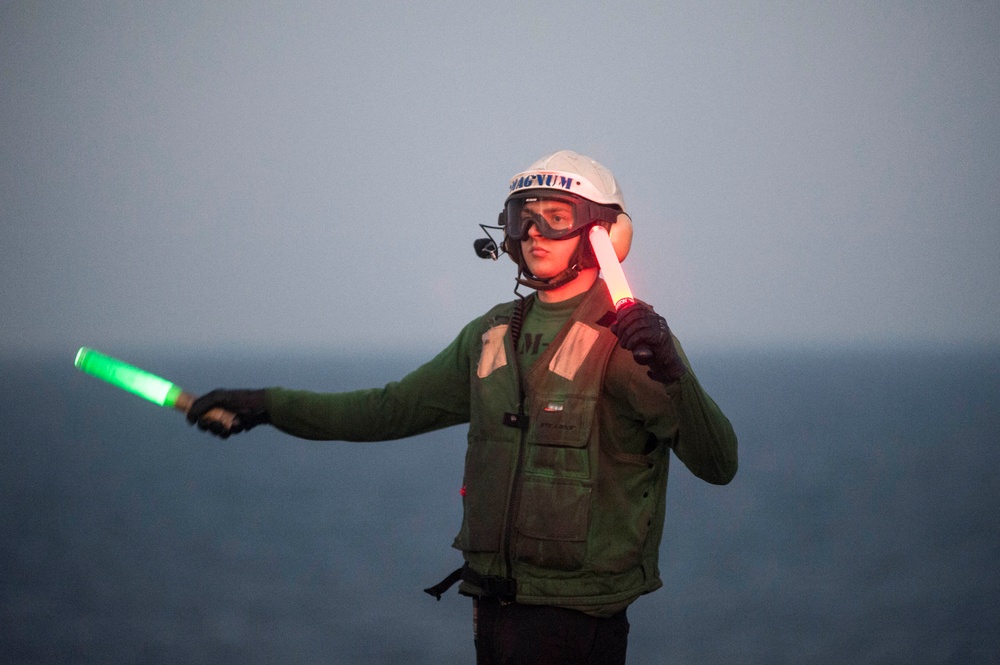 Guiding a MH-60R Sea Hawk