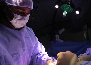 MLG Shock Trauma Platoon patches Marines, sailors up for fight during Steel Knight 14