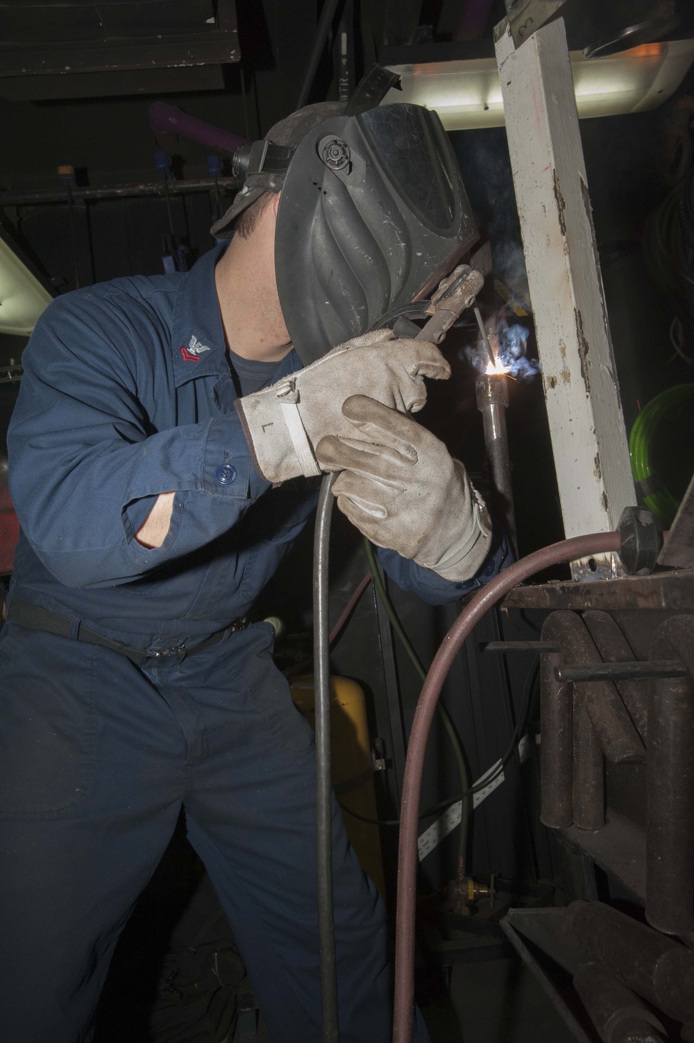 USS Harry S. Truman sailors at work