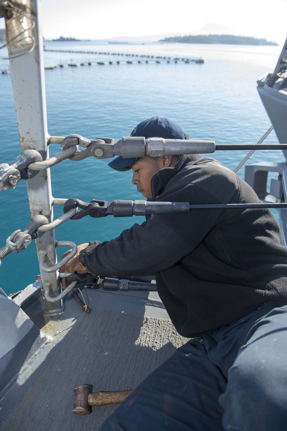 USS Stout sailor replaces cotter pin