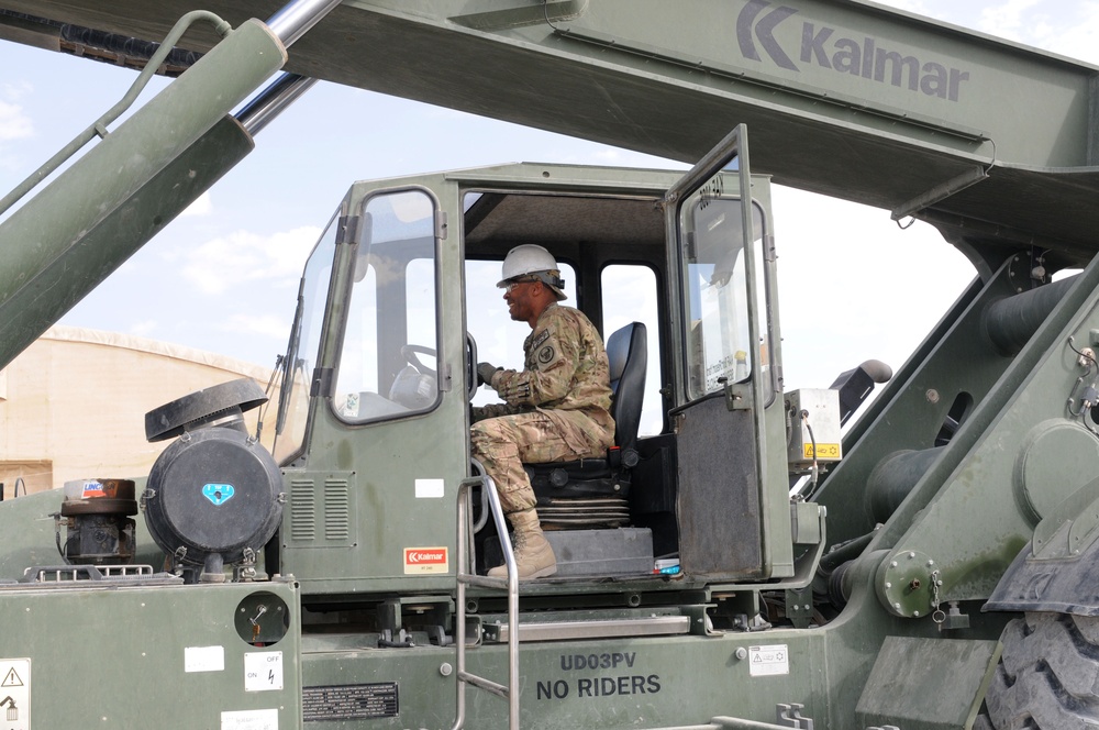 CMRE troops train on rough terrain container handler in Afghanistan