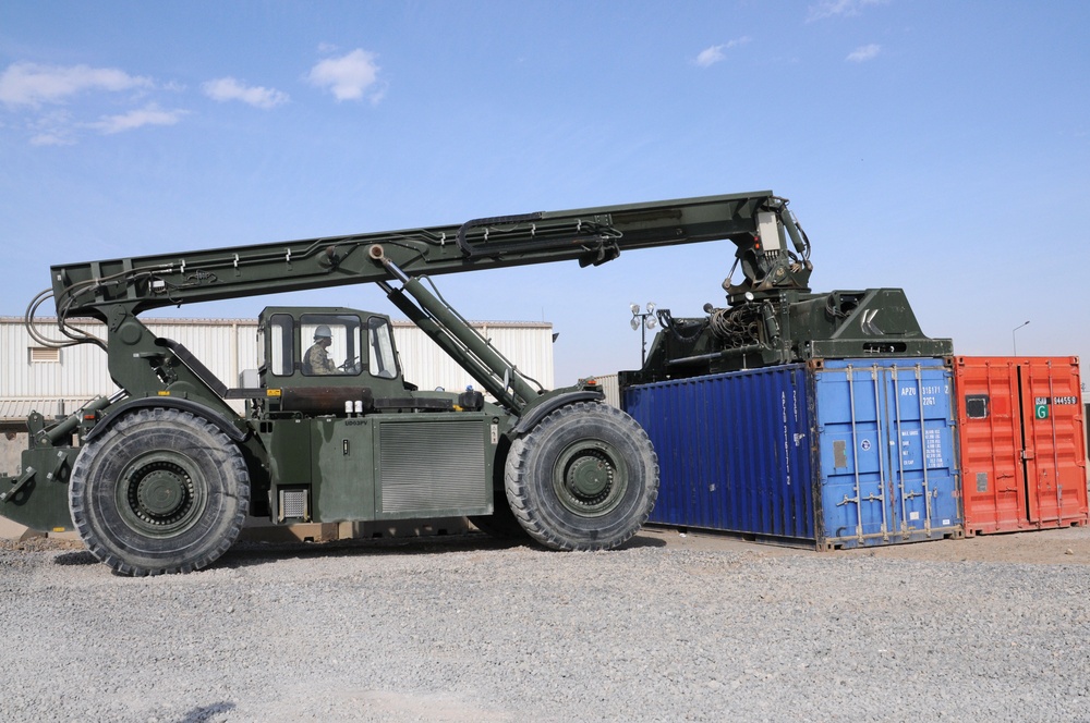 CMRE troops train on rough terrain container handler in Afghanistan