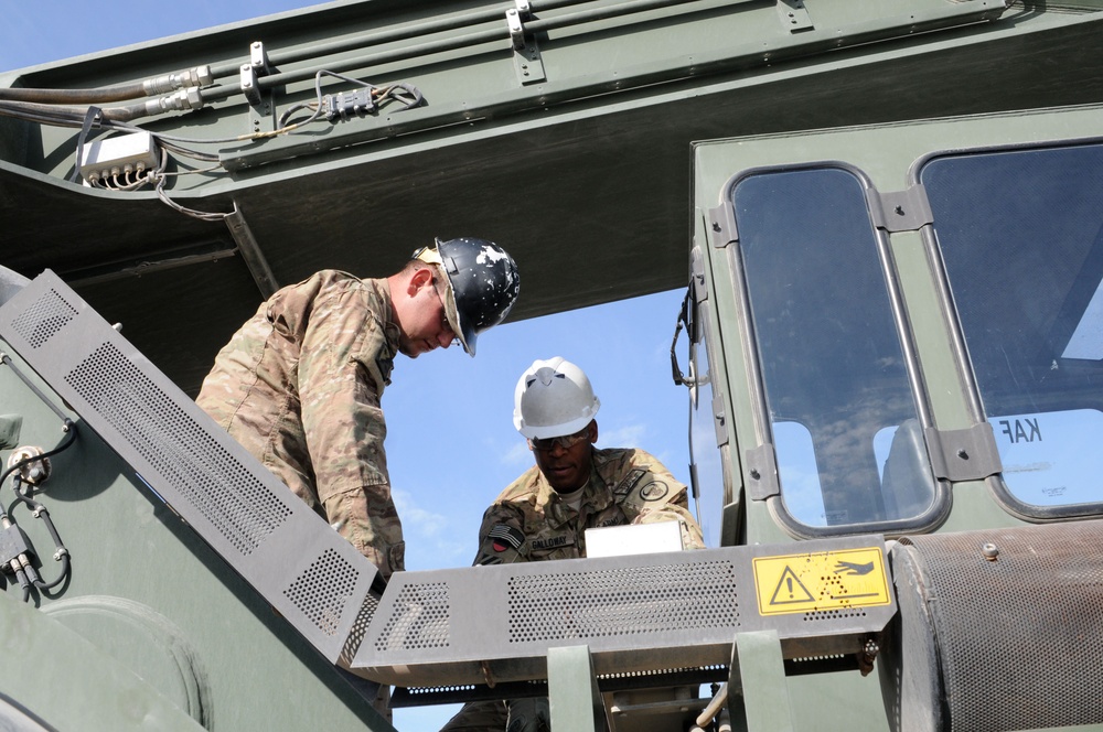 CMRE troops train on rough terrain container handler in Afghanistan