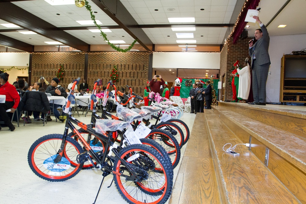 Joint base volunteers, police and Toys for Tots help disadvantaged youth