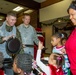 Joint base volunteers, police and Toys for Tots help disadvantaged youth