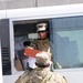 82nd SB-CMRE troops pick up holiday packages in Afghanistan
