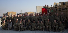 Deployed Soldiers Shave Heads for Cancer