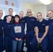 Operation Fireside volunteers take in Coast Guard recruits for Christmas