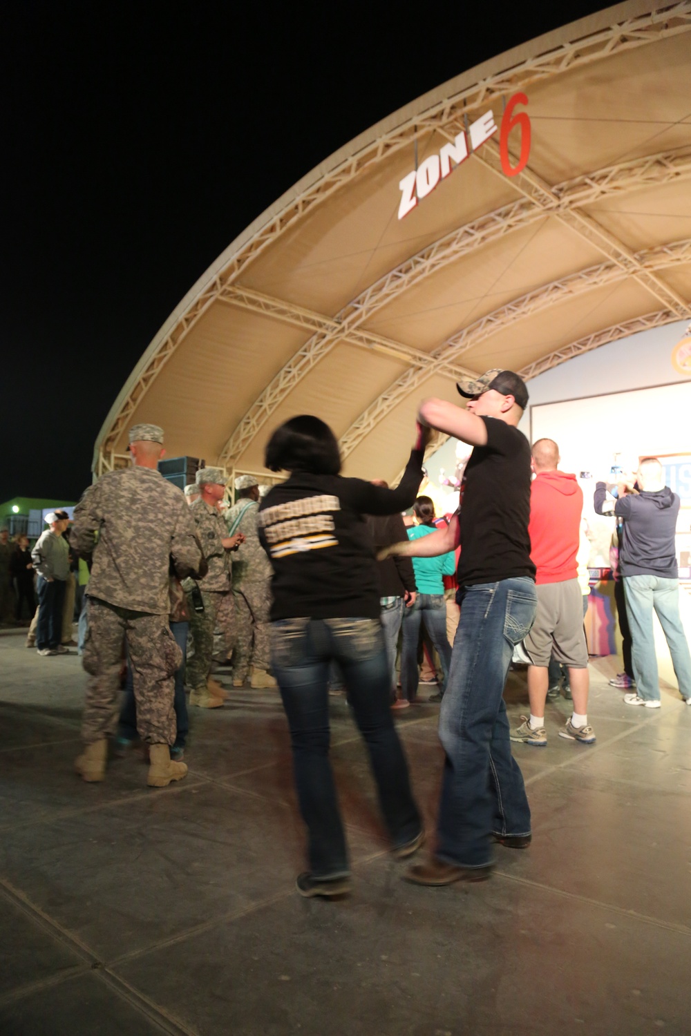 Kellie Pickler entertains the troops at Camp Arifjan, Kuwait