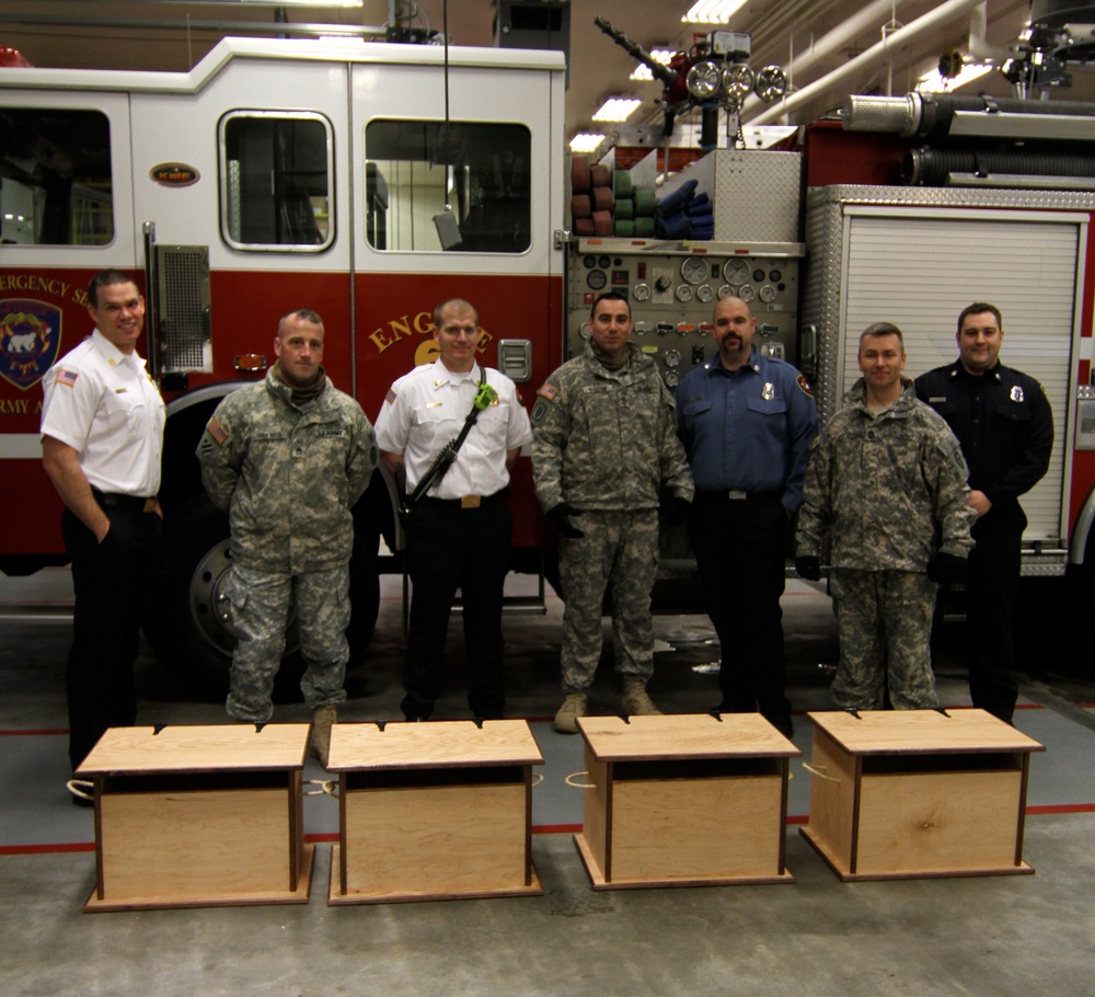 Soldiers donate toy boxes