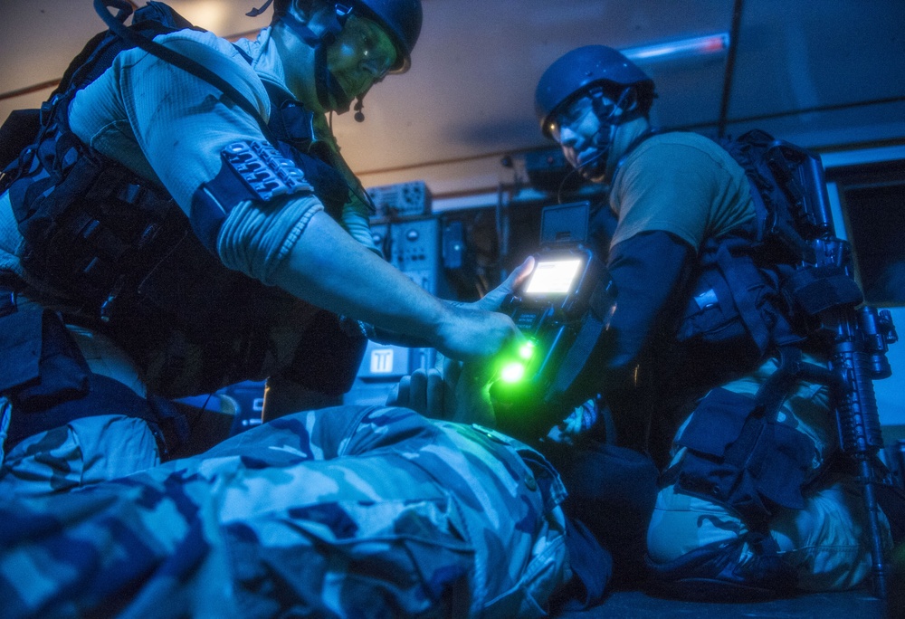 USS Roosevelt conducts its final pre-deployment evaluation with the USS George HW Bush Strike Group