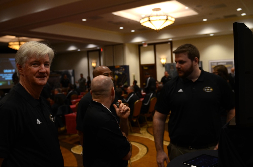 Football coaches mingle