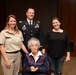 Widow of World War II Medal of Honor recipient presented with 'Deadeye' coin