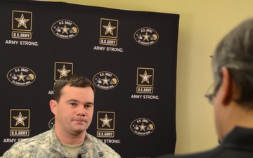 Soldier mentor conducts interview