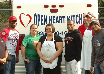 Soldiers lend helping hands to Open Heart Kitchen