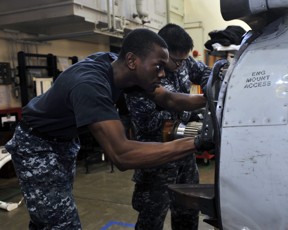 AIMD Misawa sailors perform maintenance on P-3 Orion