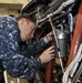 AIMD Misawa sailor performs maintenance on P-3 Orion